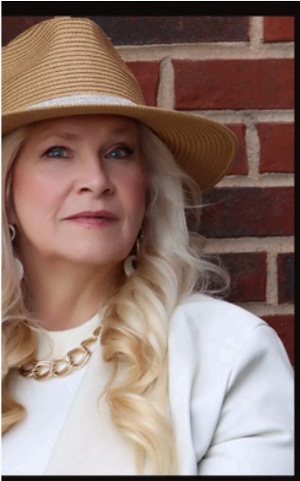 Straw hat against brick
