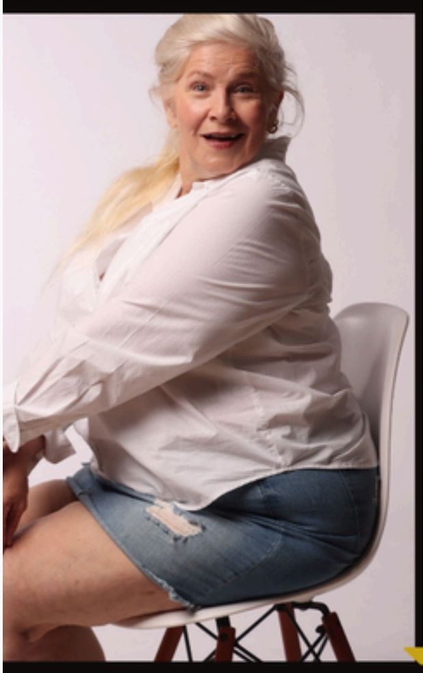 White shirt, seated laugh